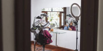 A closeup shot of a Hispanic woman with colored hair in the beauty salon in Columbia